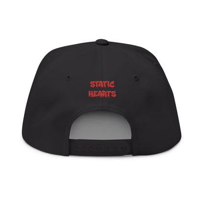 Static Hearts Skull Snapback alternative graphic t-shirt by Static Hearts inspired by pop punk, emo and horror.